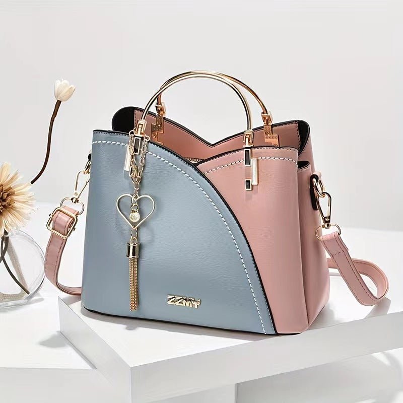Color-blocked large-capacity shoulder bag with high-quality crossbody design - F.Market59E1FAC853544B74AD93449093EB4E7Feprolo23*11.5*19Color-blocked large-capacity shoulder bag with high-quality crossbody designColor-blocked large-capacity shoulder bag with high-quality crossbody design