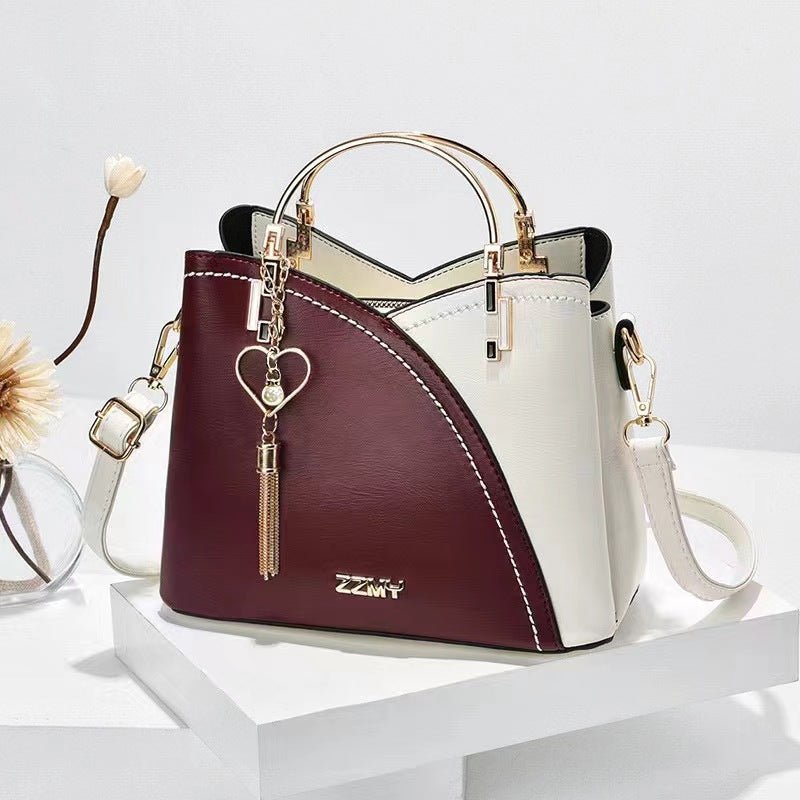 Color-blocked large-capacity shoulder bag with high-quality crossbody design - F.MarketBC9D934344D045D995BA2CBA6AEB7480eprolo23*11.5*19Color-blocked large-capacity shoulder bag with high-quality crossbody designColor-blocked large-capacity shoulder bag with high-quality crossbody design